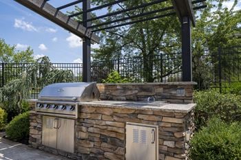 Outdoor kitchen with gas grills